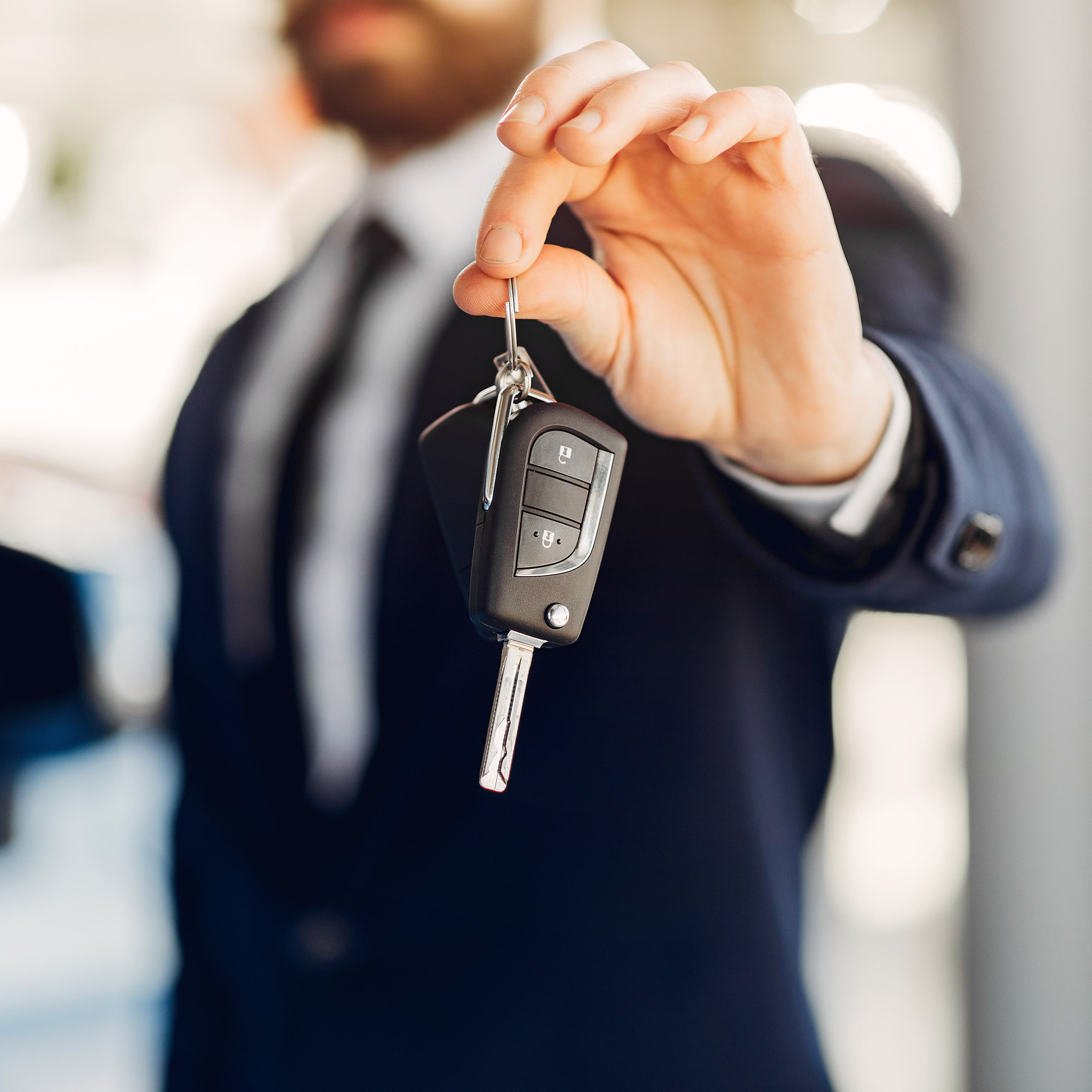 Car keys being exchanged
